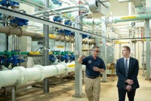NJDEP Photo/Commissioner LaTourette (left) tours the Moorestown water treatment plant, upgraded to filter contaminants of emerging concern, May 2022.